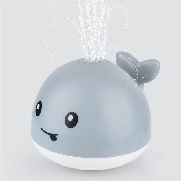 Beleuchtetes Wal-Wassersprinkler-Poolspielzeug für Babys